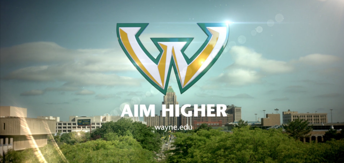 Detroit skyline and Wayne State University campus with the "Aim Higher" headline, representing the university’s forward-thinking campaign developed by Driven Creative Supply.